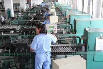 Automatic corrugated pipe forming line - production of automotive exhaust flex hoses