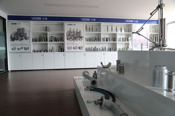 Yueding showroom displaying exhaust clamps, flex pipes, and pipe fittings