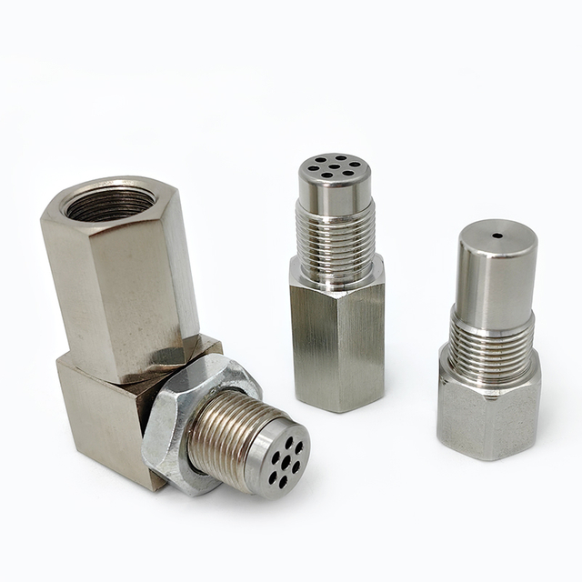 CNC machined oxygen sensor port in bulk