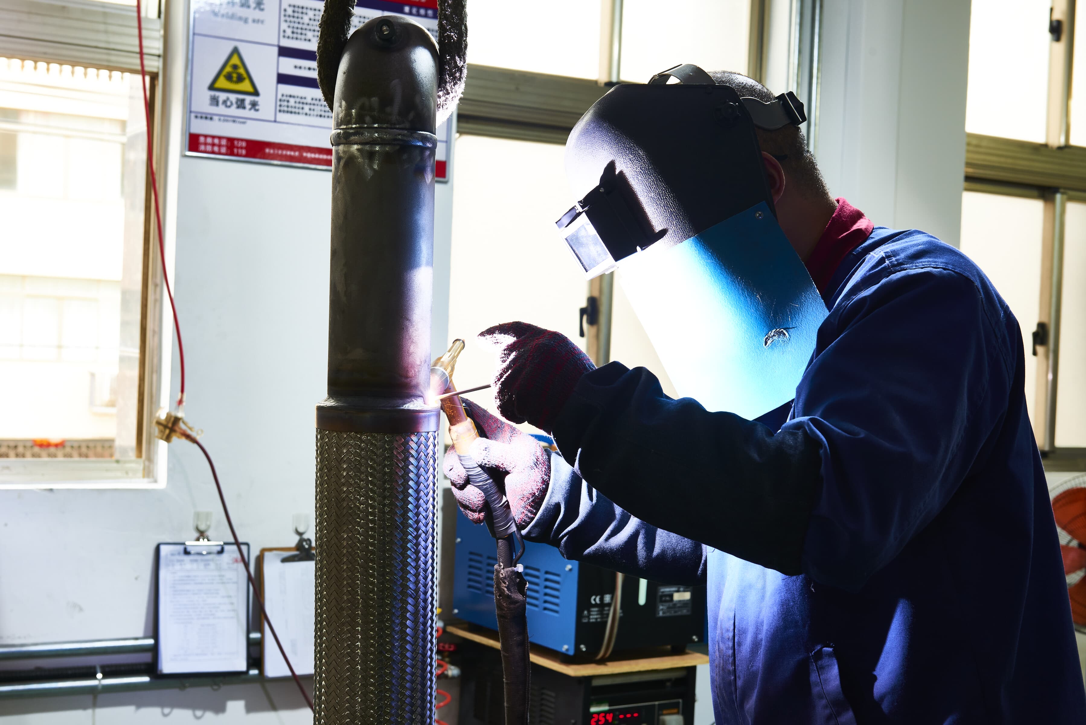 braided exhaust hand welding