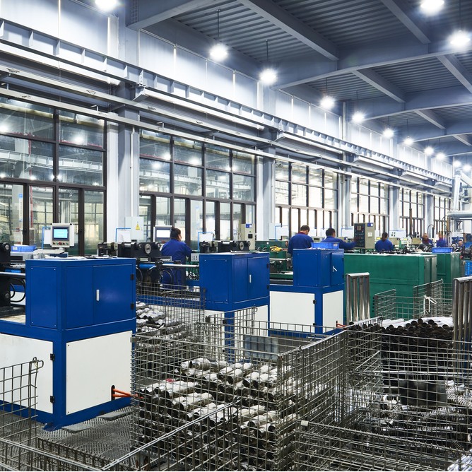 assembly line view of braided exhaust hose fabrication