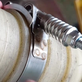 industrial hose secured with heavy duty t-bolt spring loaded clamp