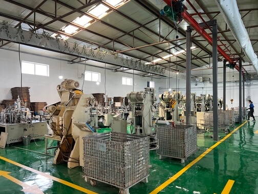 Integrated automation system for high-speed stamping and forming of small size pipe clamps