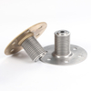 Close-up of metal bellows with threaded connections