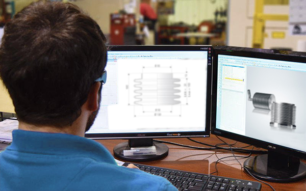 Engineer Designing Stainless Steel Bellows and Exhaust Components on CAD Software