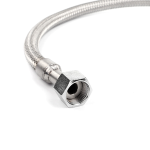 Close-up of stainless steel braided hose exterior