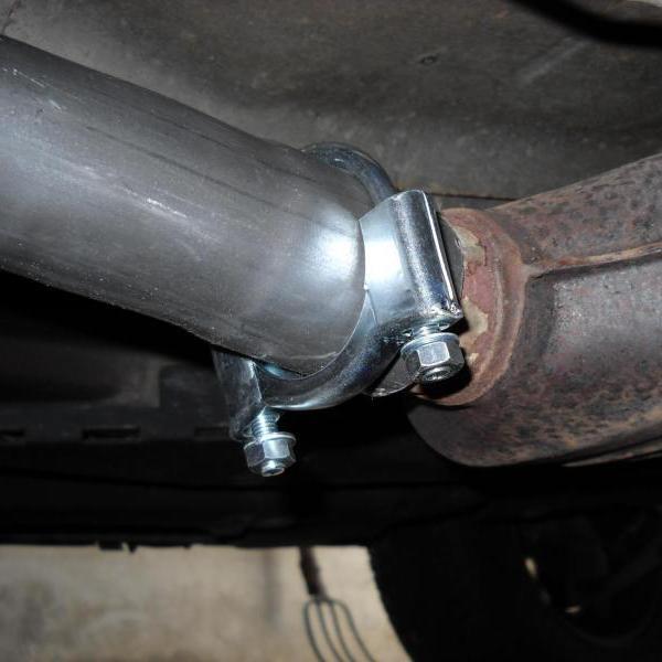 U-bolt exhaust clamp installed on an exhaust pipe connection