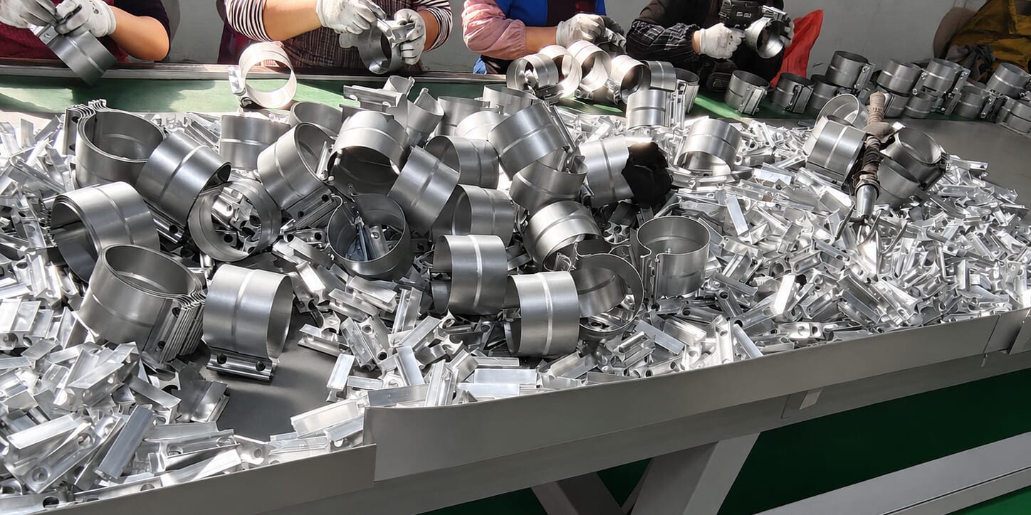 Butt joint clamp components prepared for manual assembly